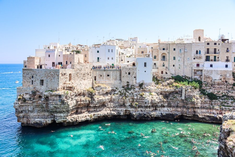 The white town of Polignano a Mare above a turquoise cove in Puglia