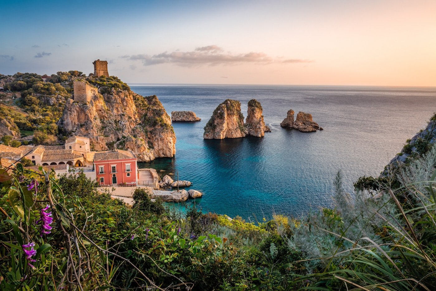The sea stacks of Scopello on the Sicilian coast at golden hour