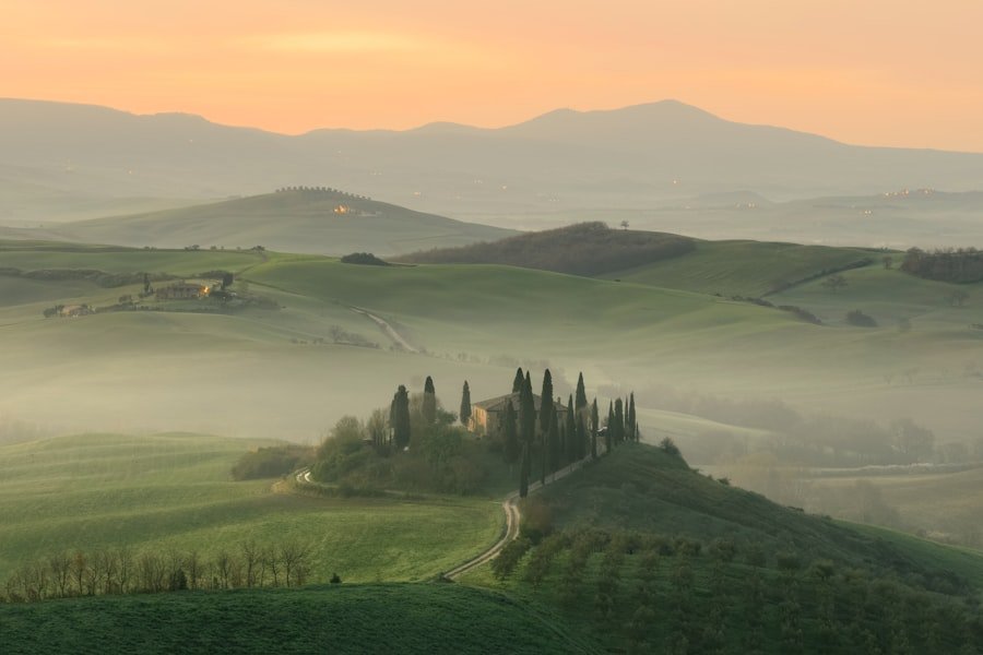 Misty rolling hills and cypress trees of the Val d'Orcia, Tuscany